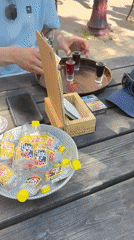 Amsterdam café crowd enjoys afternoon Flügel shots and games