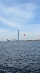 Boat passenger films Gulf of Finland with Lakhta Center visible