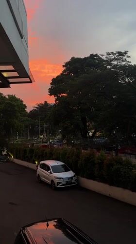 Jakarta resident documents sunset, indoor plants, hotel buffet