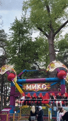 Amusement park activity documented in Minsk during evening hours