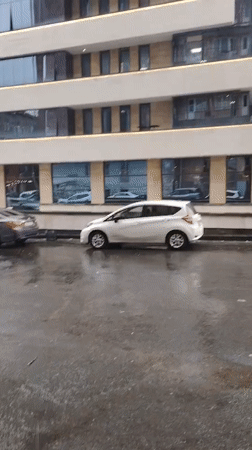 Rainy Sunday morning scenes around modern Yerevan buildings