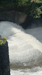 Tukad Bindu river dam operations documented in Denpasar