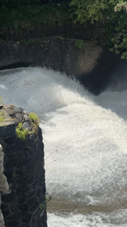 Tukad Bindu river dam operations documented in Denpasar