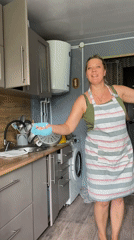 Barefoot, aproned, and singing in a Russian kitchen