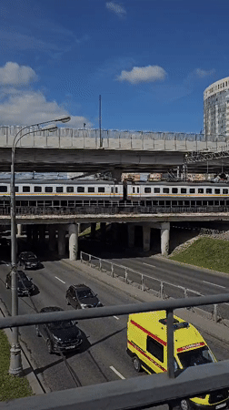 Midday street life around a Moscow highway interchange