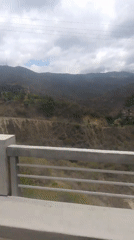 Vehicle journey through mountainous Caracas landscape recorded on video