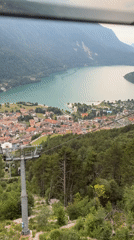 Cable car rides above Molveno and its turquoise Alpine lake