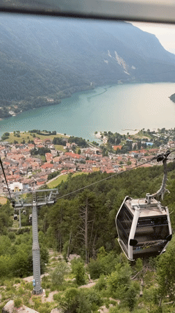 Cable car rides above Molveno and its turquoise Alpine lake