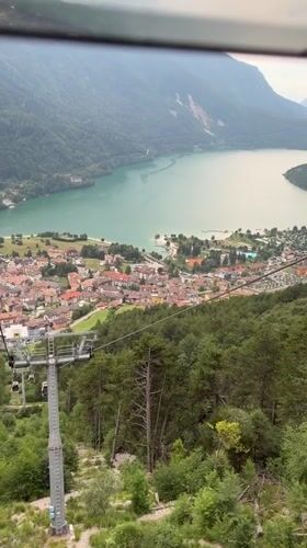 Cable car rides above Molveno and its turquoise Alpine lake