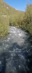 Morning river documentation captures rushing waters in Chvizhepse, Russia