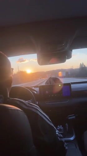 Passenger captures dramatic sunset from vehicle in Tiush, Russia