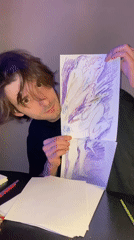 Young artist displays colored pencil drawings in Moscow