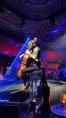 Cellist performs at illuminated Sofia restaurant