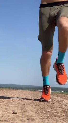 Runner jogs through fields in Perevoznoe, Russia
