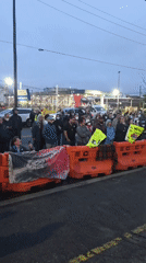 Crowd gathers outside Newark correctional facility early Sunday morning