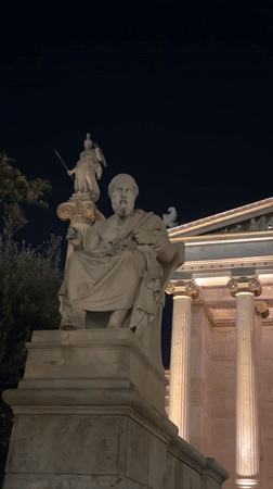 Athens' neoclassical triangle lit up on a summer night