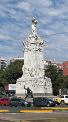 Afternoon street life documented near Buenos Aires monument district