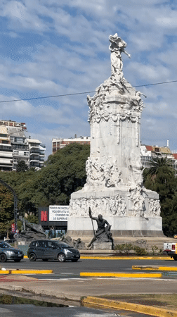 Afternoon street life documented near Buenos Aires monument district