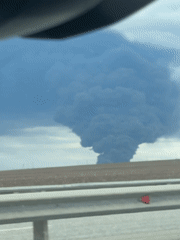 Black smoke plume observed from highway near Kosoturikha, Russia