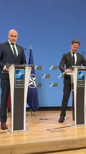 NATO officials hold a press briefing at Brussels headquarters