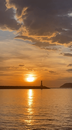 Sunset gathering draws observers to Bar Montenegro waterfront pier