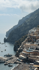 Coastal Italian town Arienzo documented during busy afternoon beach day