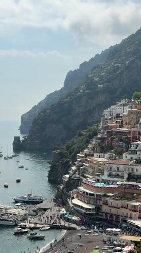 Coastal Italian town Arienzo documented during busy afternoon beach day