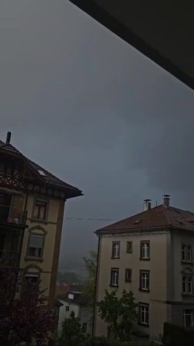 Rain falls over residential St. Gallen neighborhood