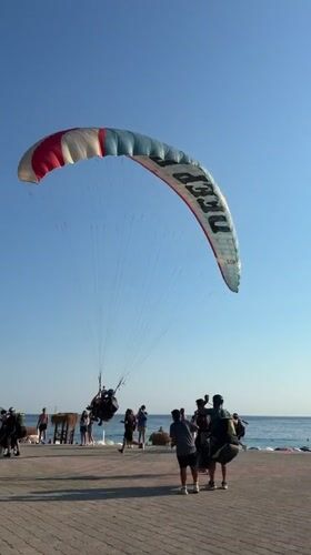 Tandem paraglider in the air above Fethiye, Turkey