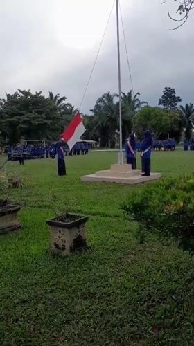 Flag ceremony held in Blangriek with students and civil servants