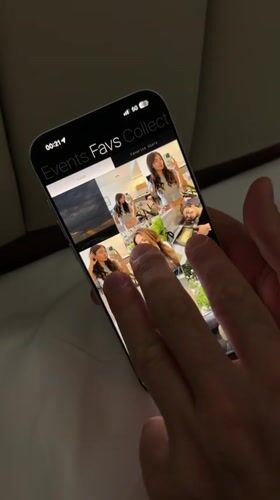 Person browses image collection app on iPhone in Beijing