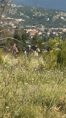 Film crew works outdoors as plane flies over Podgorica