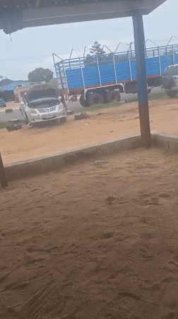 Text graphics and roadside car work in Jalingo, Nigeria