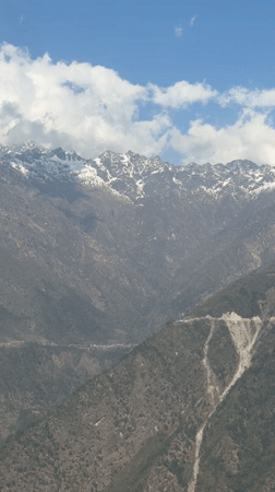 Aerial footage captures lush mountain landscape near Takasindu, Nepal