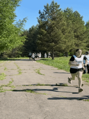 Youth athletes train in Забегалово park during sunny morning