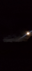 Full moon with halo observed through clouds in Venezuela
