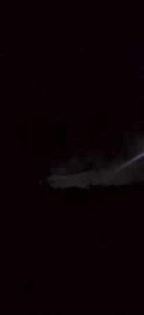 Full moon with halo observed through clouds in Venezuela