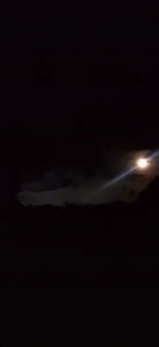 Full moon with halo observed through clouds in Venezuela