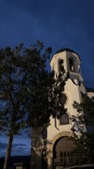 Orthodox church tower photographed at dusk in Strelcha, Bulgaria
