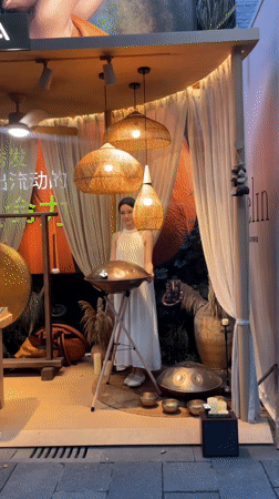 Street scenes, handpan music, and floral displays across Shanghai