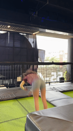 Young person performs backflip on indoor trampoline in Mexico City