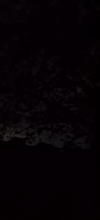 Cloudy night sky with bright moon observed in Venezuela