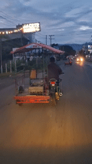 Motorcycle with red sidecar spotted on Indonesian road