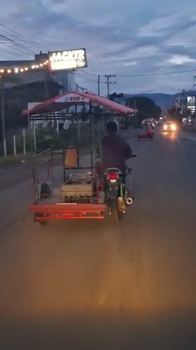 Motorcycle with red sidecar spotted on Indonesian road