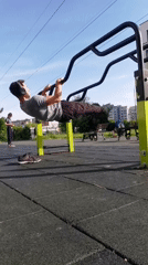 Man exercises at outdoor gym in Burgas, Bulgaria