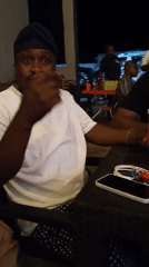 Evening social gathering at outdoor café in Lokoja, Nigeria