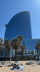 Sunny afternoon beach activity recorded near Barcelona's W Hotel