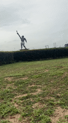 Torch-bearing statue documented in Ihiagwa park, Nigeria