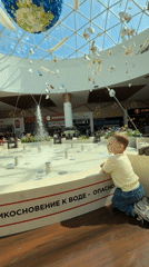 Child's morning activities captured across Vladivostok shopping venues