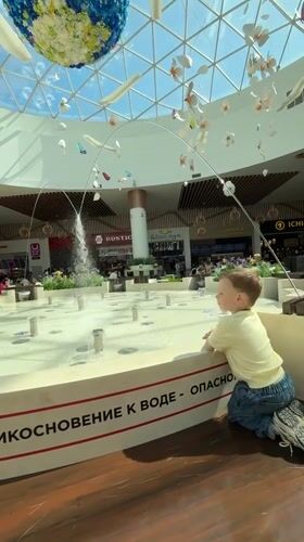 Child's morning activities captured across Vladivostok shopping venues
